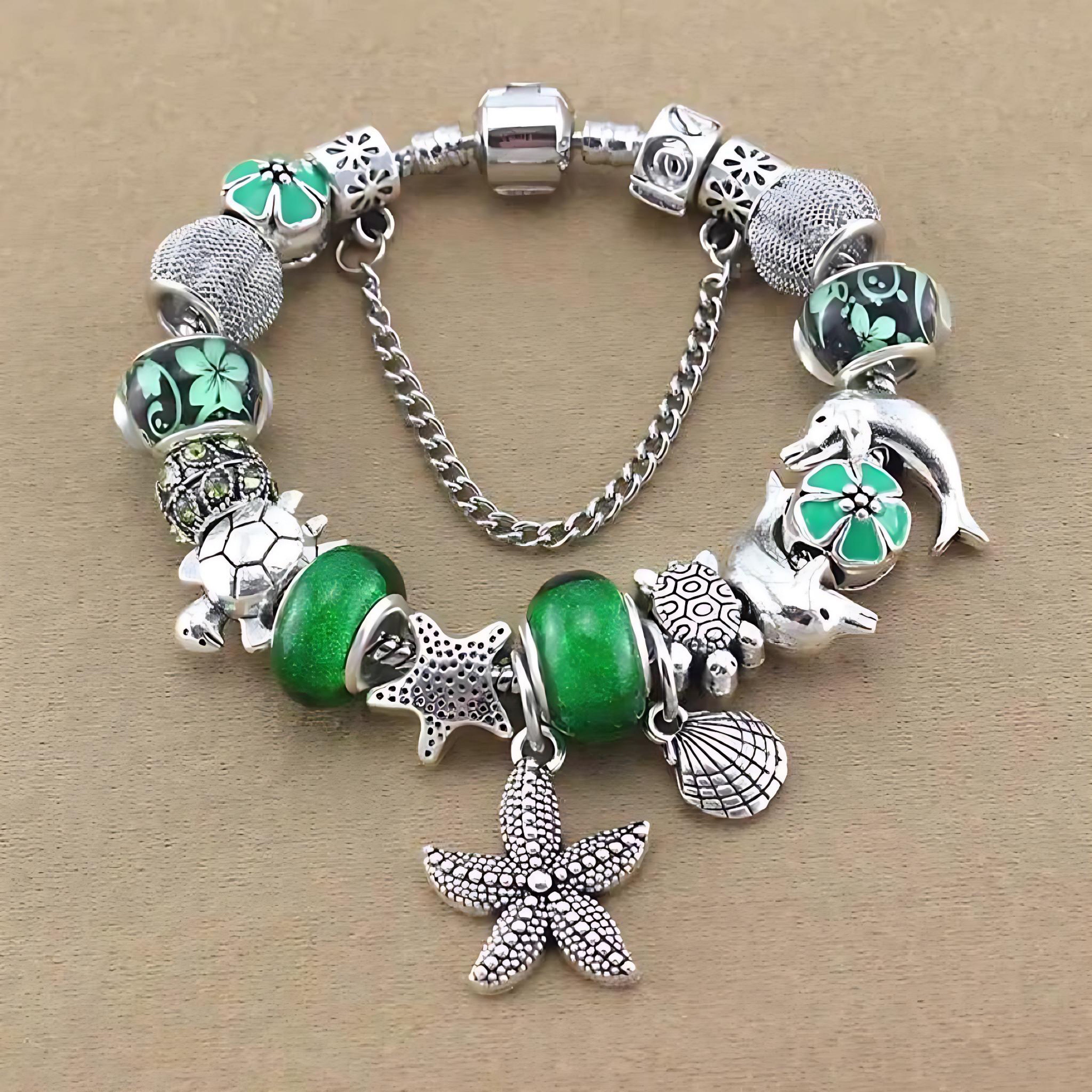 Ocean Series Green Glass Bead Bracelet – Dolphin, Shell & Starfish Charms by Wave & Hang