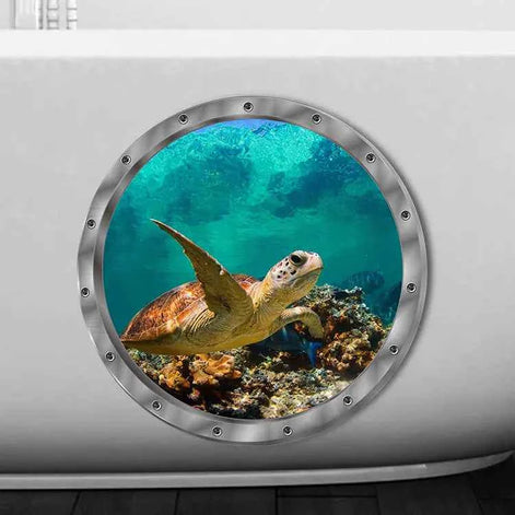 3D ocean turtle sticker with round metallic porthole frame installed on bathroom or laundry surface
