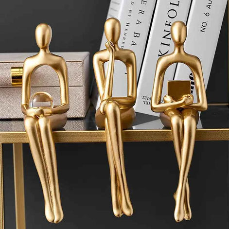 Golden Abstract Sculpture – Modern Resin Sitting Figurine for Home & Office Decor
