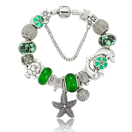 Ocean Series Green Glass Bead Bracelet – Dolphin, Shell & Starfish Charms by Wave & Hang