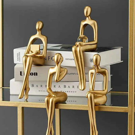 Golden Abstract Sculpture – Modern Resin Sitting Figurine for Home & Office Decor