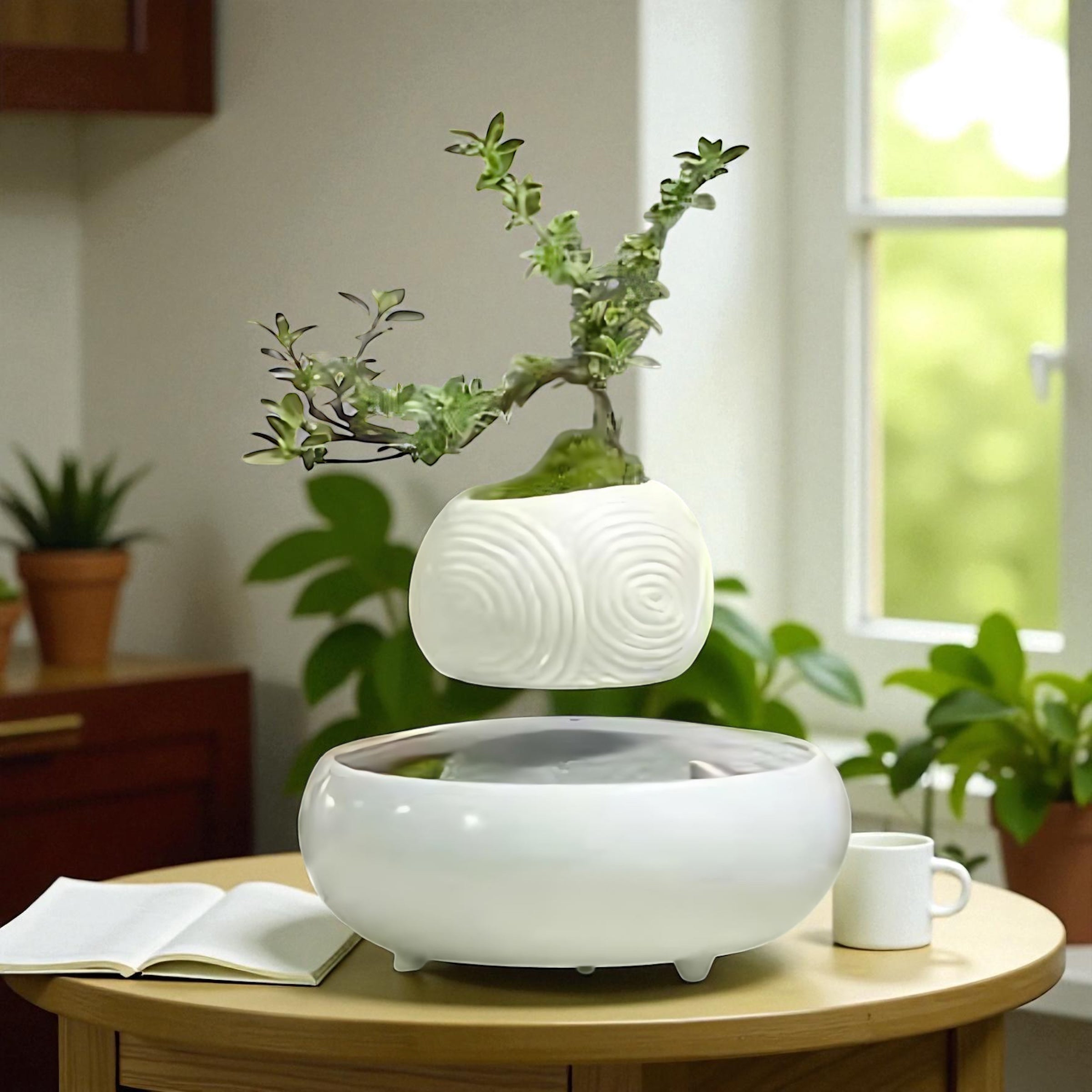 White spherical floating planter holding a small bonsai tree above magnetic base