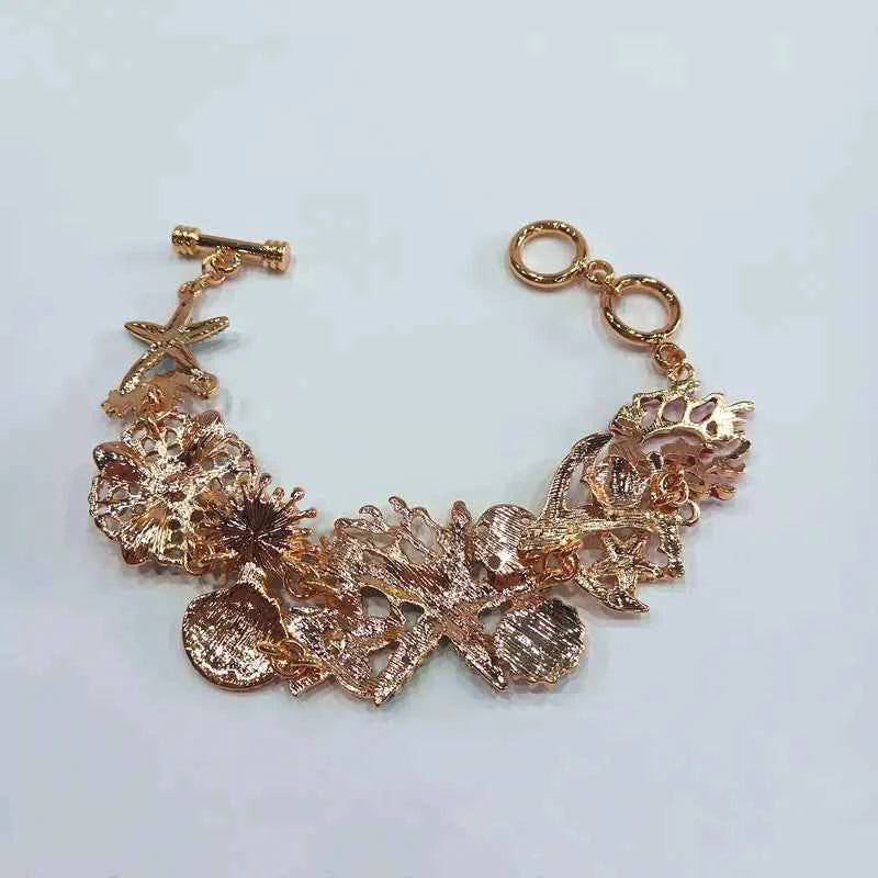 Ocean-Themed Starfish & Anchor Bracelet – 99 Carat Inspired Jewelry