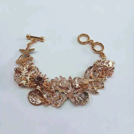 Ocean-Themed Starfish & Anchor Bracelet – 99 Carat Inspired Jewelry