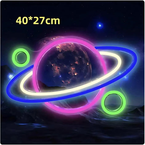 Pink and blue neon LED planet with rings, space-themed wall decor