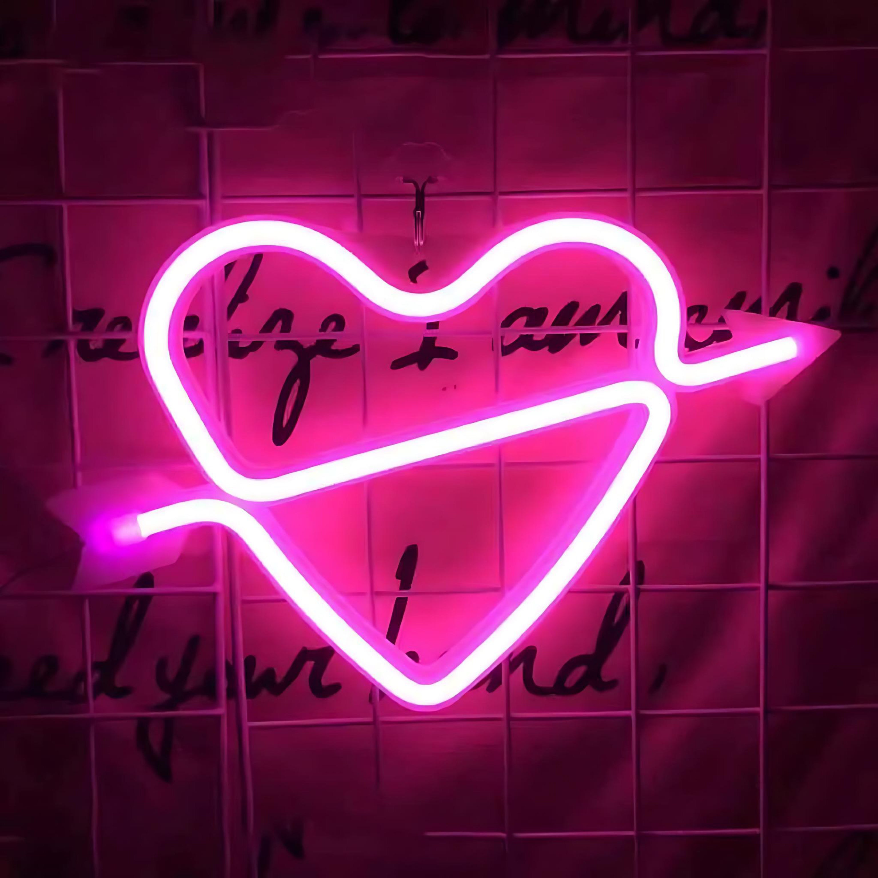 Pink neon heart-shaped LED wall light
