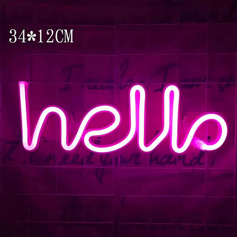 Pink neon sign that spells the word hello