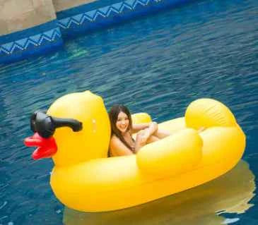 Giant Inflatable Duck Pool Float with Sunglasses – Oversized Swimming Ring for Adults