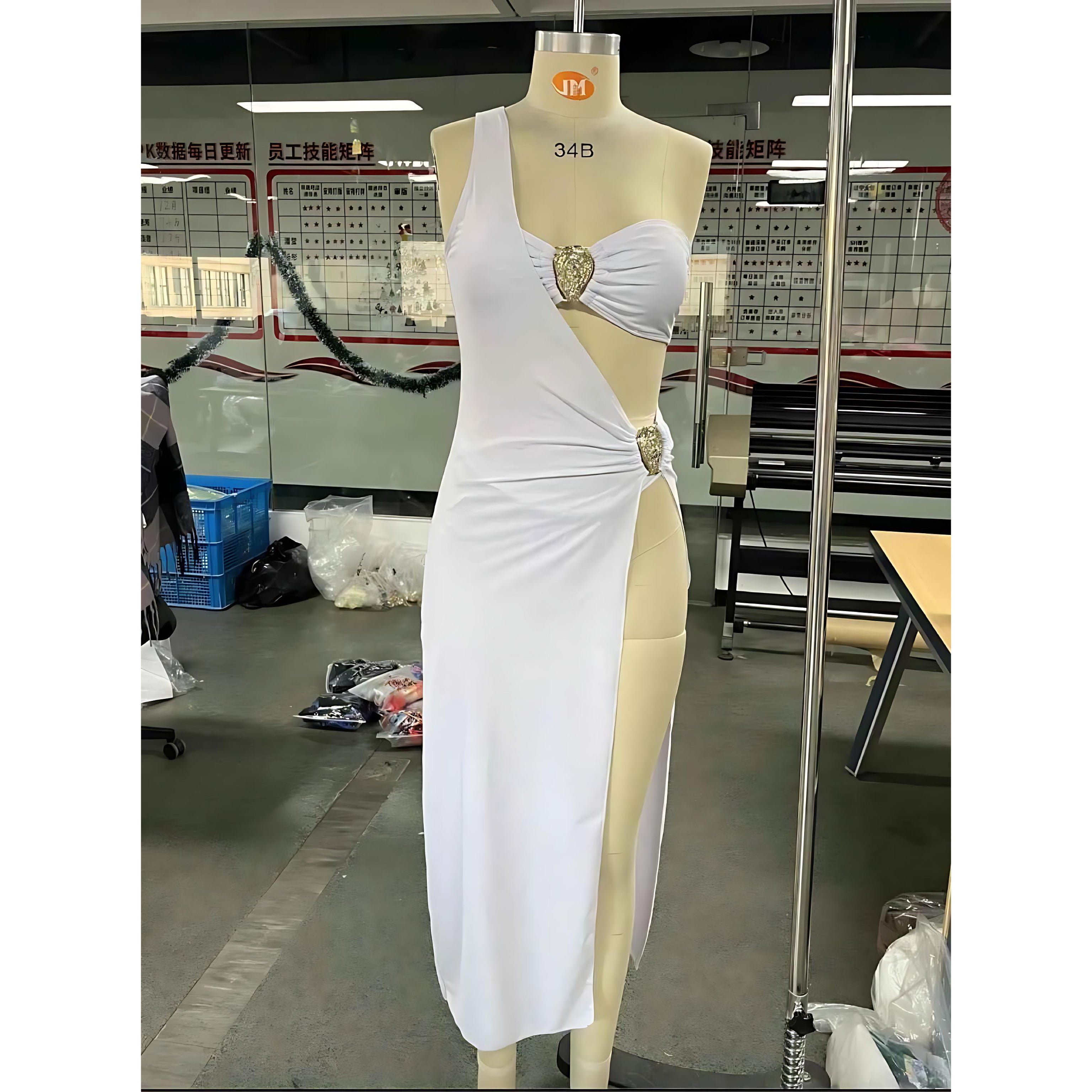 White bikini tube top, bottom and long cover-up skirt displayed on mannequin