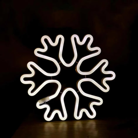 White neon snowflake shaped wall light