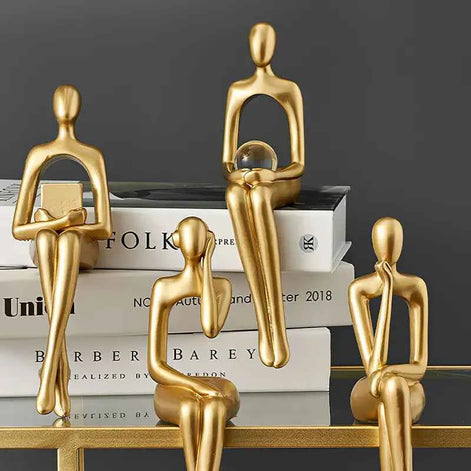 Golden Abstract Sculpture – Modern Resin Sitting Figurine for Home & Office Decor