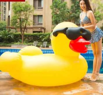 Giant Inflatable Duck Pool Float with Sunglasses – Oversized Swimming Ring for Adults